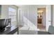 Bright home office space with closet and view of adjacent bathroom at 909 Cirrus Cloud Ave, Las Vegas, NV 89138