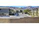 Picturesque street view of a well-maintained neighborhood, showcasing mountain views in the distance at 909 Cirrus Cloud Ave, Las Vegas, NV 89138