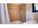 Bathroom featuring tiled shower-tub combo with a vanity and a showerhead at 914 Tam O Shanter, Las Vegas, NV 89109