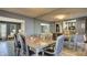 Elegant dining room with a mirrored wall and a modern glass-top table for stylish entertaining at 914 Tam O Shanter, Las Vegas, NV 89109