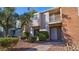Charming townhome with brick accents, balcony, well-maintained landscaping and inviting front entrance at 914 Tam O Shanter, Las Vegas, NV 89109