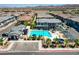 Aerial view of the community showcasing the pool, landscaping, and residential buildings at 965 Nevada State Dr # 38202, Henderson, NV 89002