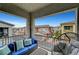 This balcony offers a relaxing outdoor space with comfortable seating and neighborhood views at 965 Nevada State Dr # 38202, Henderson, NV 89002