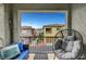 View from the balcony featuring stylish seating and a view of the community's exterior at 965 Nevada State Dr # 38202, Henderson, NV 89002