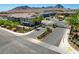Community entrance featuring well-maintained landscaping and secure gated access at 965 Nevada State Dr # 38202, Henderson, NV 89002