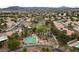 Picturesque aerial view showcases a neighborhood park featuring a basketball court and playground at 10 Staghorn St, Henderson, NV 89012