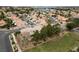 Wide aerial showcasing the home in its community, with mature trees and landscaping at 10 Staghorn St, Henderson, NV 89012