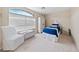 Cozy bedroom features ample natural light and a charming decor at 10 Staghorn St, Henderson, NV 89012