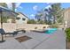 Enjoy a relaxing afternoon in this backyard with a refreshing pool and shaded lounge area at 10500 Pacific Palisades Ave, Las Vegas, NV 89144