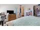 Comfortable bedroom with mermaid decor and a writing desk at 10500 Pacific Palisades Ave, Las Vegas, NV 89144