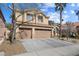 Lovely two-story home featuring a three-car garage and well-maintained landscaping at 10500 Pacific Palisades Ave, Las Vegas, NV 89144