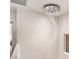 Stairway featuring an elegant crystal spiral chandelier at 11178 Corsica Mist Ave, Las Vegas, NV 89135
