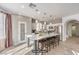 Modern kitchen with a large island, stainless steel appliances, and light fixtures at 11178 Corsica Mist Ave, Las Vegas, NV 89135
