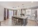 Bright and airy kitchen with a large island and modern appliances at 11178 Corsica Mist Ave, Las Vegas, NV 89135