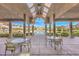 Resort-style pool area with covered seating and views, perfect for outdoor relaxation and recreation at 11178 Corsica Mist Ave, Las Vegas, NV 89135