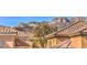 View of rooftops with mountain views showcasing the surrounding landscape at 11178 Corsica Mist Ave, Las Vegas, NV 89135
