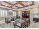 Cozy sitting area with comfortable armchairs, stylish decor, and natural light from large windows at 11178 Corsica Mist Ave, Las Vegas, NV 89135