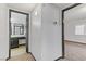 Hallway leading to the bedroom and bathroom with carpeted floors at 1390 Vegas Valley Dr # 26, Las Vegas, NV 89169