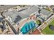Detailed aerial view of home with solar panels and a private pool, highlighting the property's energy efficiency and recreational space at 1912 Parkchester Dr, Las Vegas, NV 89108
