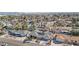 Expansive aerial view of a residential neighborhood with single-Gathering homes and mature trees at 1912 Parkchester Dr, Las Vegas, NV 89108