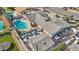 Aerial view of a single-Gathering home with a sparkling pool, solar panels, and multiple parking spaces at 1912 Parkchester Dr, Las Vegas, NV 89108