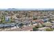 High-angle view of a suburban community with tree-lined streets and various architectural styles at 1912 Parkchester Dr, Las Vegas, NV 89108