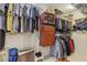 Walk-in closet with hanging rods, shelves, and plenty of storage space at 1912 Parkchester Dr, Las Vegas, NV 89108