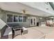 Covered patio with ceiling fans and outdoor kitchen setup, ideal for relaxation at 1912 Parkchester Dr, Las Vegas, NV 89108