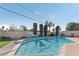 Sparkling pool with slide and well-maintained surroundings, perfect for summer fun at 1912 Parkchester Dr, Las Vegas, NV 89108