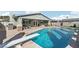 Swimming pool with diving board and adjacent patio, great for outdoor enjoyment at 1912 Parkchester Dr, Las Vegas, NV 89108