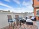 Cozy backyard patio with bar stool seating, a cushioned seating area, and paver flooring at 2005 Via Firenze, Henderson, NV 89044
