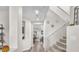 Bright hallway with wood flooring, staircase and access to other rooms at 2005 Via Firenze, Henderson, NV 89044