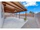 Covered patio and backyard space with gravel and block wall fencing at 2029 Rose Coral Ave, Las Vegas, NV 89106