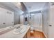Functional bathroom with a combination tub and shower, vanity, and toilet at 2029 Rose Coral Ave, Las Vegas, NV 89106