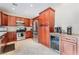 Gourmet kitchen with granite countertops and stainless steel appliances at 2057 Wandering Doe Ln, Las Vegas, NV 89134