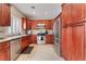 Spacious kitchen with stainless steel appliances and granite countertops at 2057 Wandering Doe Ln, Las Vegas, NV 89134