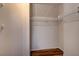 Walk-in closet with hardwood floors and wire shelving for organized storage solutions at 2516 Evansville Ave, Henderson, NV 89052