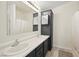 This bathroom has double sinks, a large mirror, and shower with tub combo at 274 Aztec Ln, Henderson, NV 89015