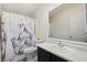 Bathroom featuring decorative shower curtain and vanity at 274 Aztec Ln, Henderson, NV 89015