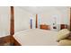 Bright bedroom showcasing a four-poster bed frame, hardwood floors, and natural light at 274 Aztec Ln, Henderson, NV 89015