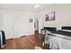 Bedroom with hardwood floors, two closets and ceiling fan at 274 Aztec Ln, Henderson, NV 89015