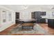 Spacious dining area features a rustic table, bench, and built-in cabinetry at 274 Aztec Ln, Henderson, NV 89015