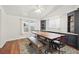Dining area with a rustic table, bench seating and dark wood built-in cabinets at 274 Aztec Ln, Henderson, NV 89015