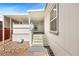 Charming entrance steps leading to a covered front porch, with stone landscaping at 274 Aztec Ln, Henderson, NV 89015