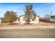 Charming single-story home with a well-maintained yard and driveway at 274 Aztec Ln, Henderson, NV 89015