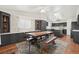 Eat-in kitchen featuring dark cabinetry, an island, and a skylight above the table at 274 Aztec Ln, Henderson, NV 89015