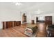 Spacious living room showcasing hardwood floors with seamless flow into dining area at 274 Aztec Ln, Henderson, NV 89015