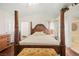 Main bedroom features a four poster bed frame, a walk-in closet and ensuite at 274 Aztec Ln, Henderson, NV 89015