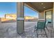 Inviting backyard patio with seating area, ideal for outdoor entertaining and relaxation at 290 Mount Tyndall St, Henderson, NV 89015