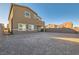 Beautiful exterior elevation showcases the home and spacious backyard with patio at 290 Mount Tyndall St, Henderson, NV 89015